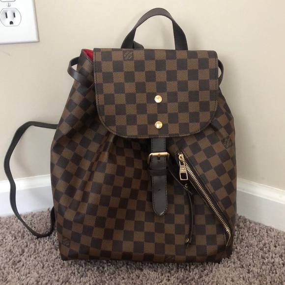 checkered leather backpack